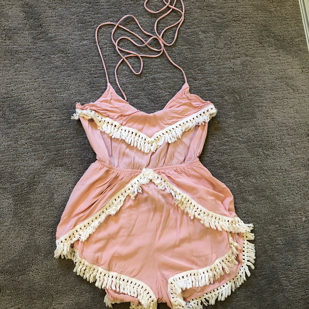Pink romper with whites tassels